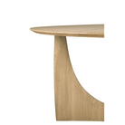 The Round Geometric Dining Table in Oak from Ethnicraft side view.