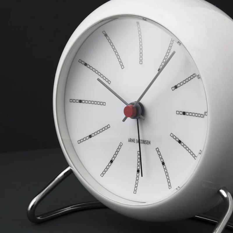 The Banker's Alarm Clock from Arne Jacobsen Clocks in an office.