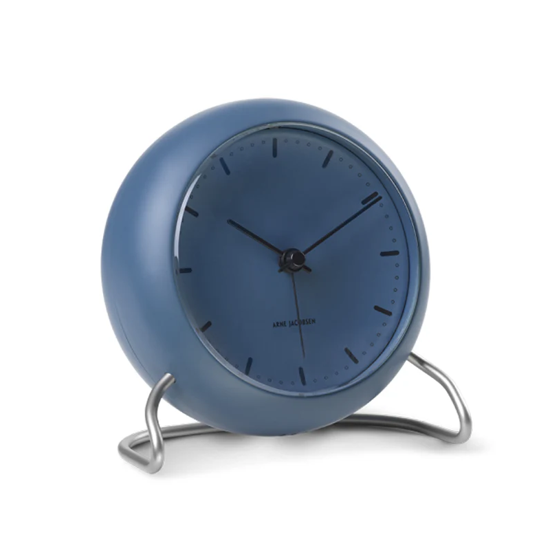 The City Hall Alarm Clock from Arne Jacobsen Clocks in stone blue from the side.