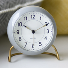 The Station Alarm Clock from Arne Jacobsen in a kitchen and dining setting.