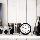 The Station Alarm Clock from Arne Jacobsen in an office.