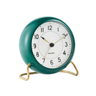 The Station Alarm Clock from Arne Jacobsen in racing green from the side.