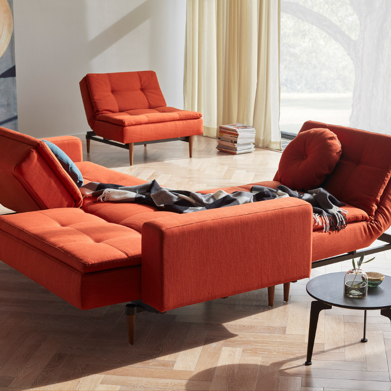 The Dublexo Styletto Sofa Bed with Arms from Innovation Living in a family room.