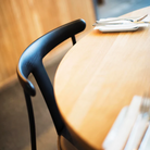 The Era Dining Chair from Eikund of Norway in a kitchen and dining set up.