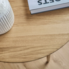 The Round Evja Coffee Table from Eikund of Norway in a living room.