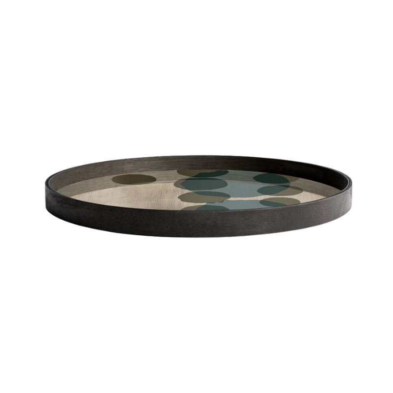 The Layered Dots Glass Tray from Ethnicraft round shape, medium size from the side.