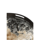 The Organic Glass Tray from Ethnicraft round shape, small size in black in a close up.