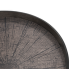 The Slice Wooden Tray from Ethnicraft round shape, size large in black in a close up.