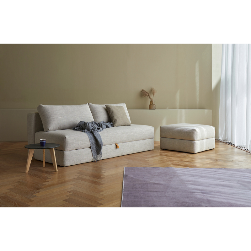 The Cornila Ottoman from Innovation Living in a family space.