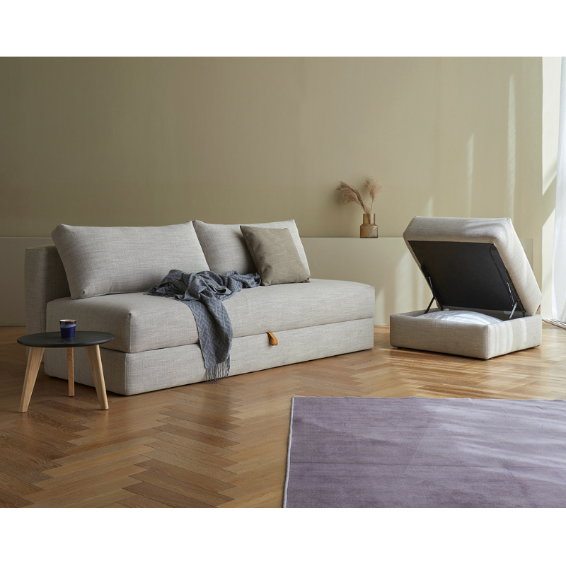 The Cornila Ottoman from Innovation Living in a lifestyle photograph.