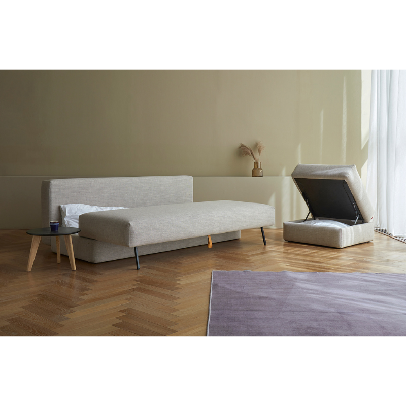 The Cornila Ottoman from Innovation Living in a lounge.