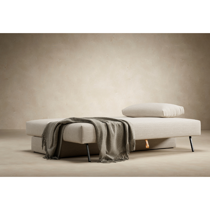 The Osvald Sofa Bed from Innovation Living setup as a bed.