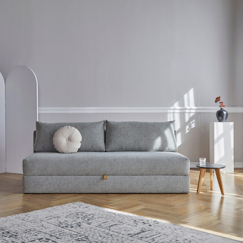 The Osvald Sofa Bed from Innovation Living in a lounge.