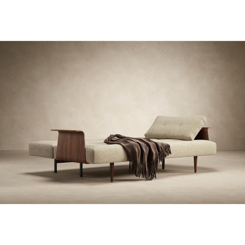 The Recast Sofa Bed Dark Styletto With Arms from Innovation Living in a family space.