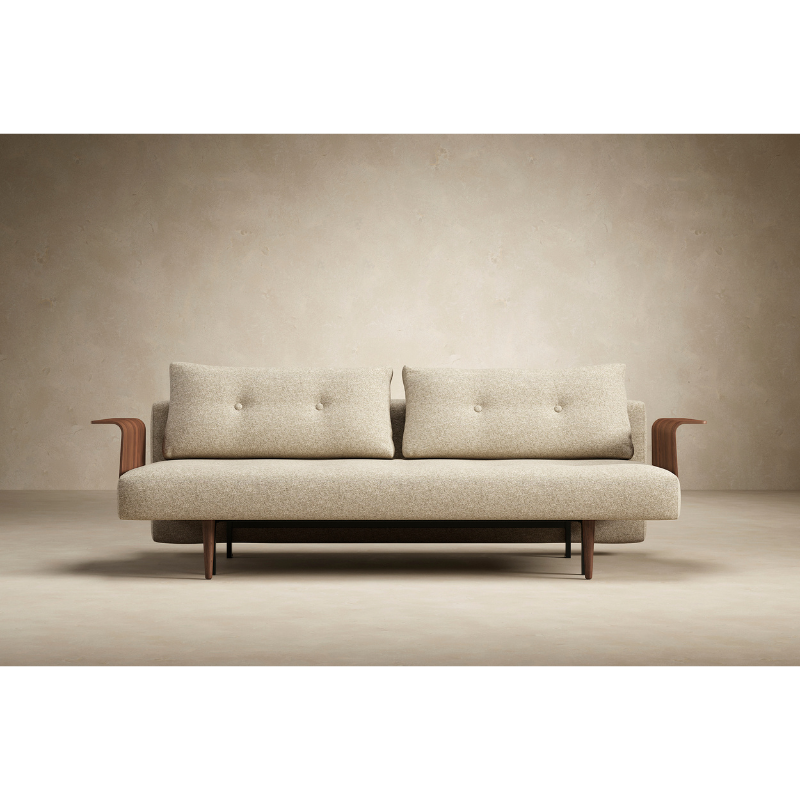 The Recast Sofa Bed Dark Styletto With Arms from Innovation Living in a living room.