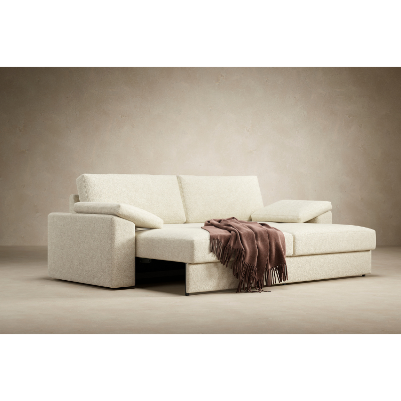 The Vilander Sofa Bed With Cushion Arms from Innovation Living in a den.