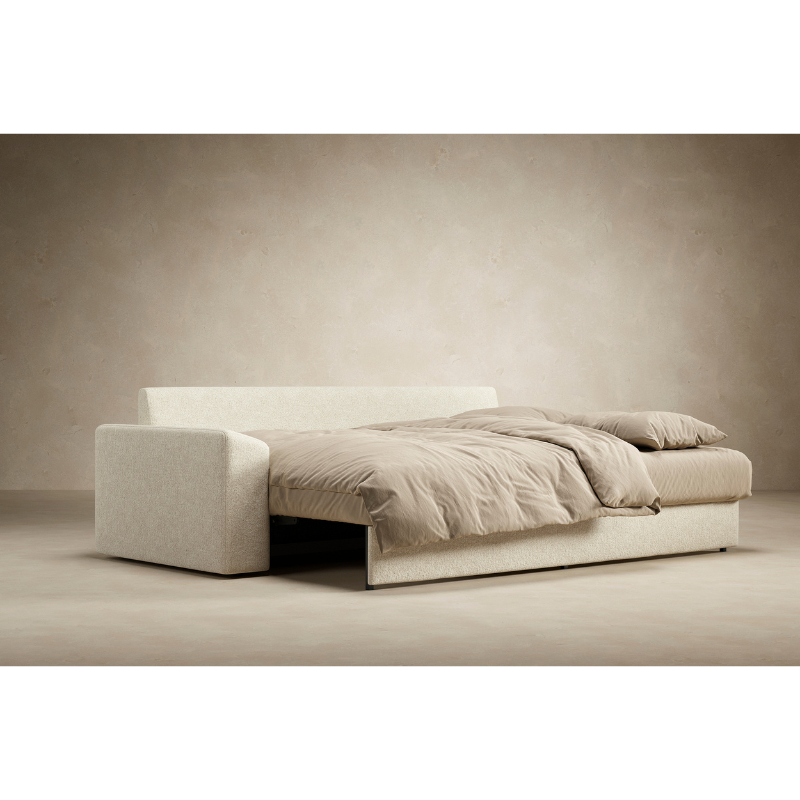 The Vilander Sofa Bed With Cushion Arms from Innovation Living in a home.