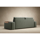 The Vilander Sofa Bed With Wide Arms from Innovation Living in a lounge.