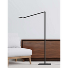 The Focaccia Floor Lamp from Koncept in a bedroom.