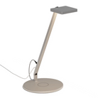 The Focaccia Solo Lamp from Koncept with the wireless charging base in silver.