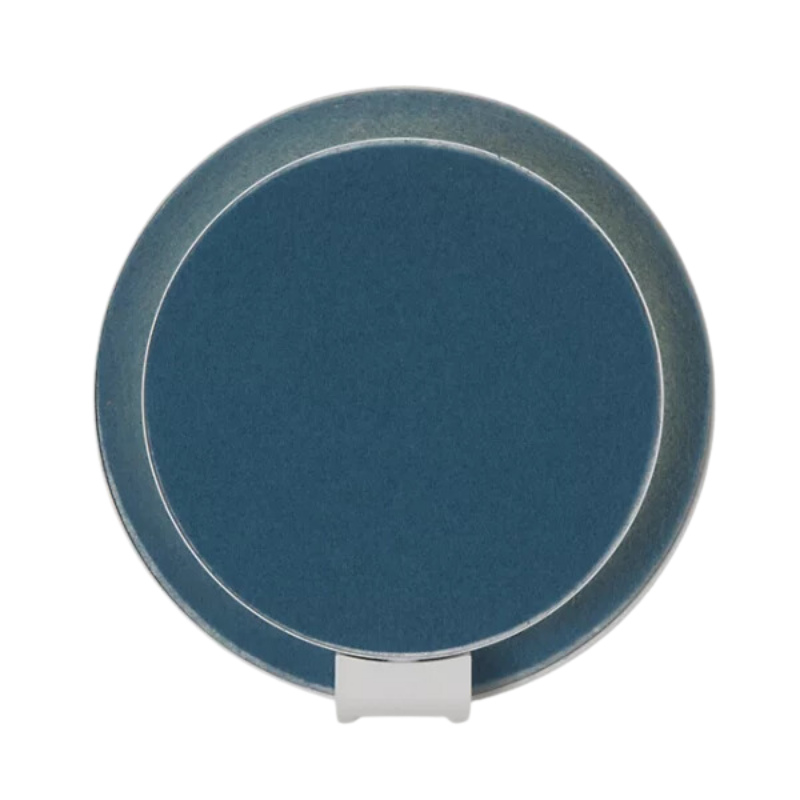 The Plug-In Gravy Wall Sconce from Koncept with the matte white body and azure (felt) plate.