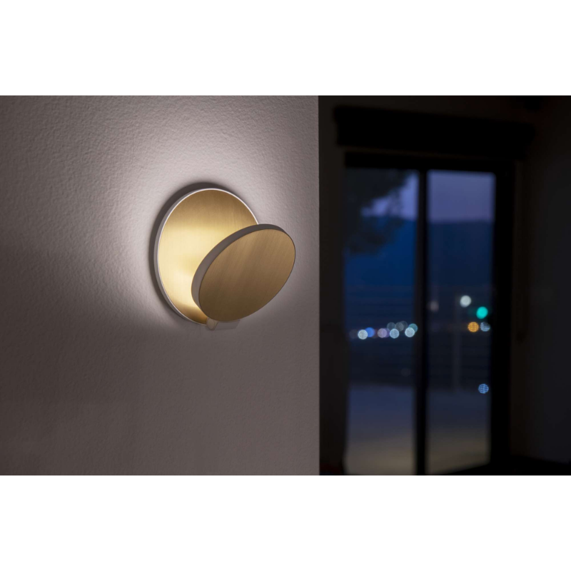 The Gravy Wall Sconce from Koncept in a residential setting.