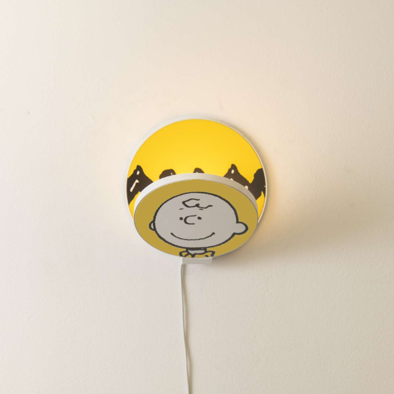 The Peanuts Edition Gravy Wall Sconce  from Koncept in the Charlie Brown style from the front.