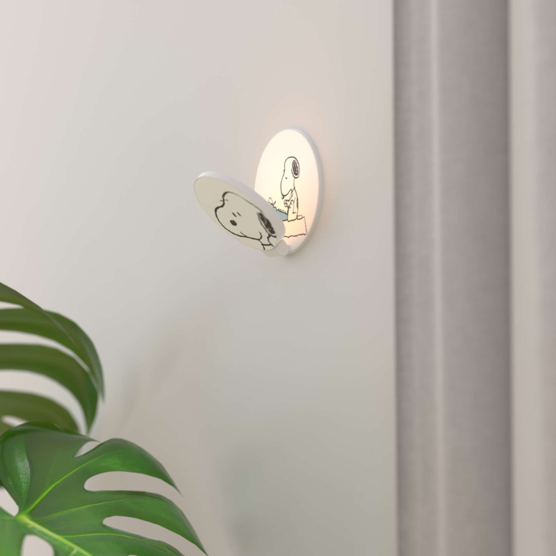 The Peanuts Edition Gravy Wall Sconce  from Koncept in the Snoopy style in a family space.