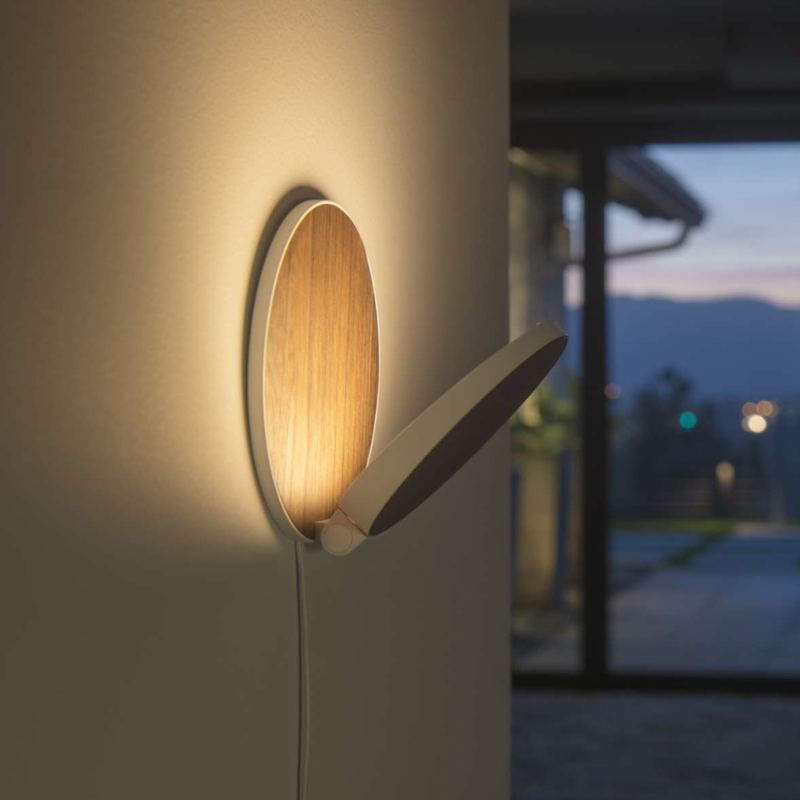 The Plug-In Gravy Wall Sconce from Koncept in a close up lifestyle photograph.