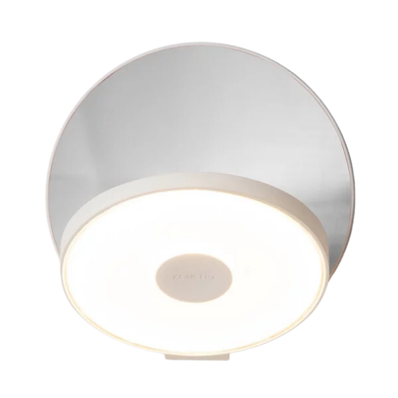 The Plug-In Gravy Wall Sconce from Koncept with the matte white body and chrome plate.