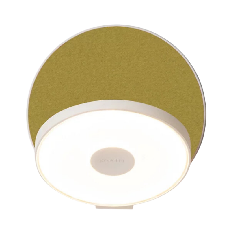 The Plug-In Gravy Wall Sconce from Koncept with the matte white body and honeydew (felt) plate.