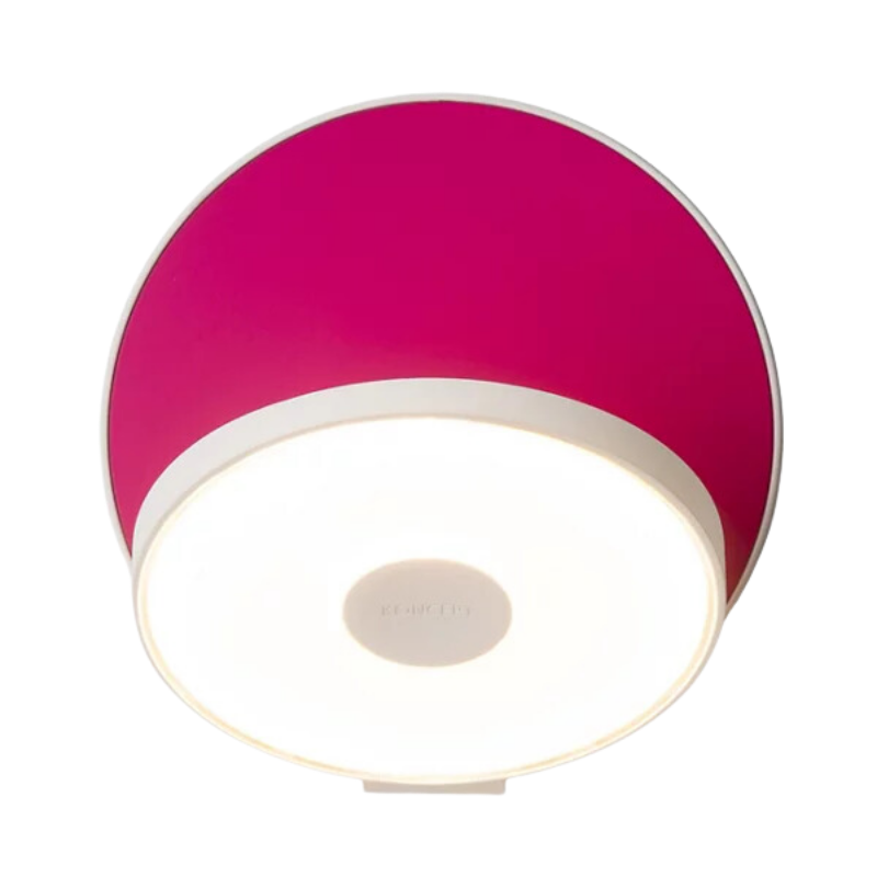 The Plug-In Gravy Wall Sconce from Koncept with the matte white body and matte hot pink plate.