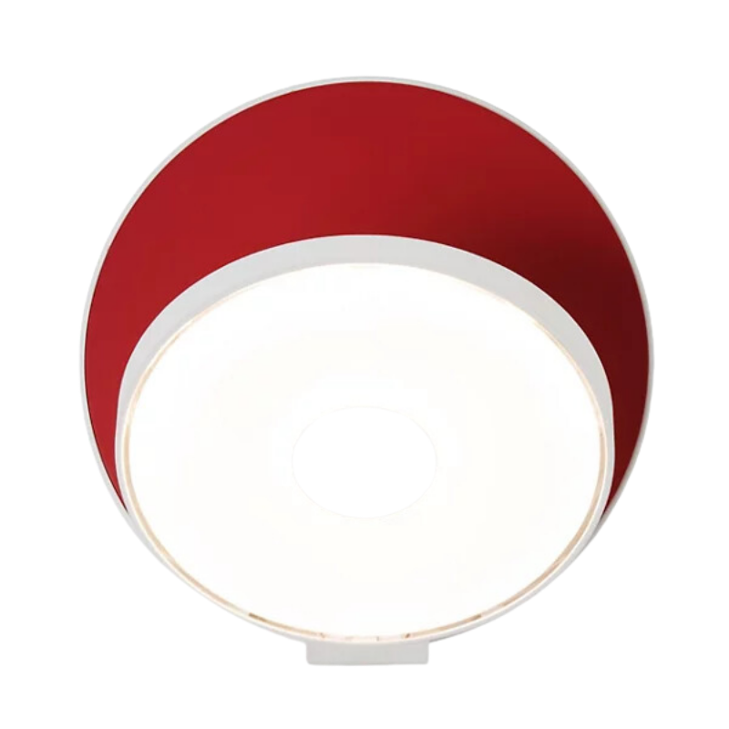 The Plug-In Gravy Wall Sconce from Koncept with the matte white body and matte red plate.