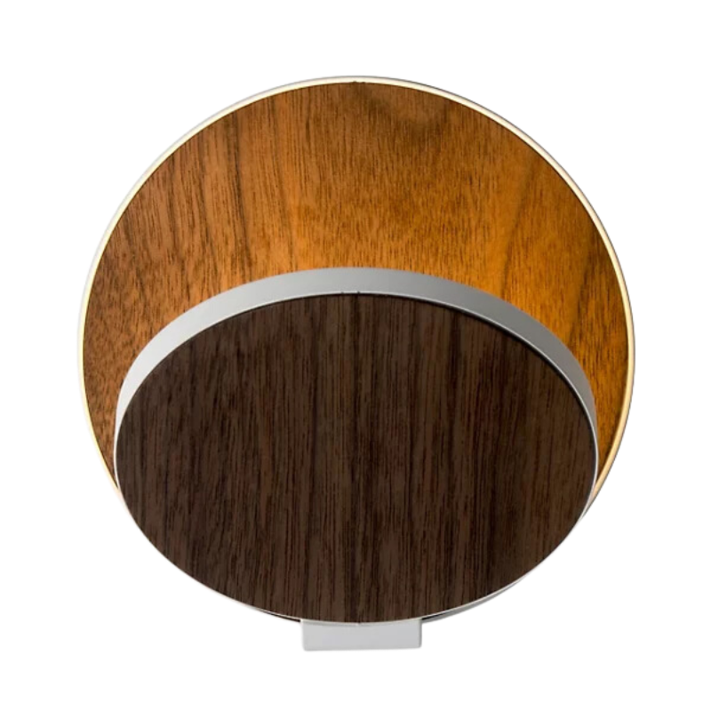 The Plug-In Gravy Wall Sconce from Koncept with the matte white body and oiled walnut plate.