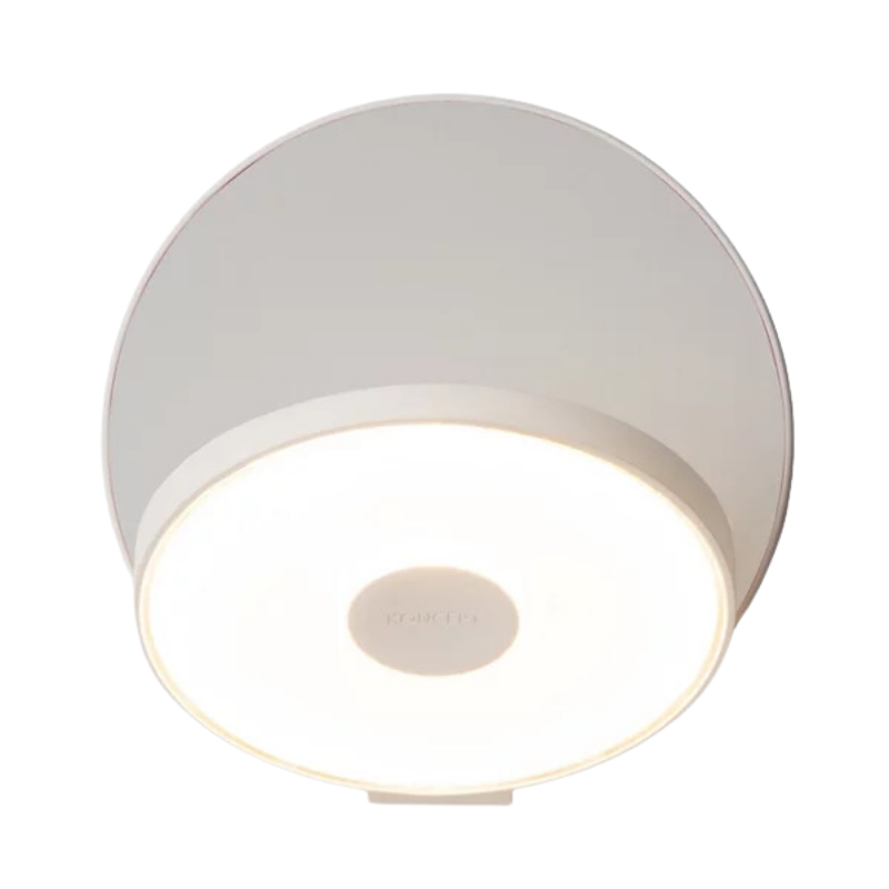 The Plug-In Gravy Wall Sconce from Koncept with the matte white body and silver plate.