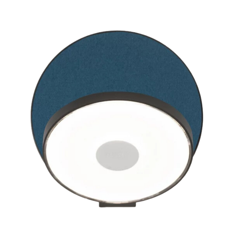 The Plug-In Gravy Wall Sconce from Koncept with the metallic black body and azure (felt) plate.