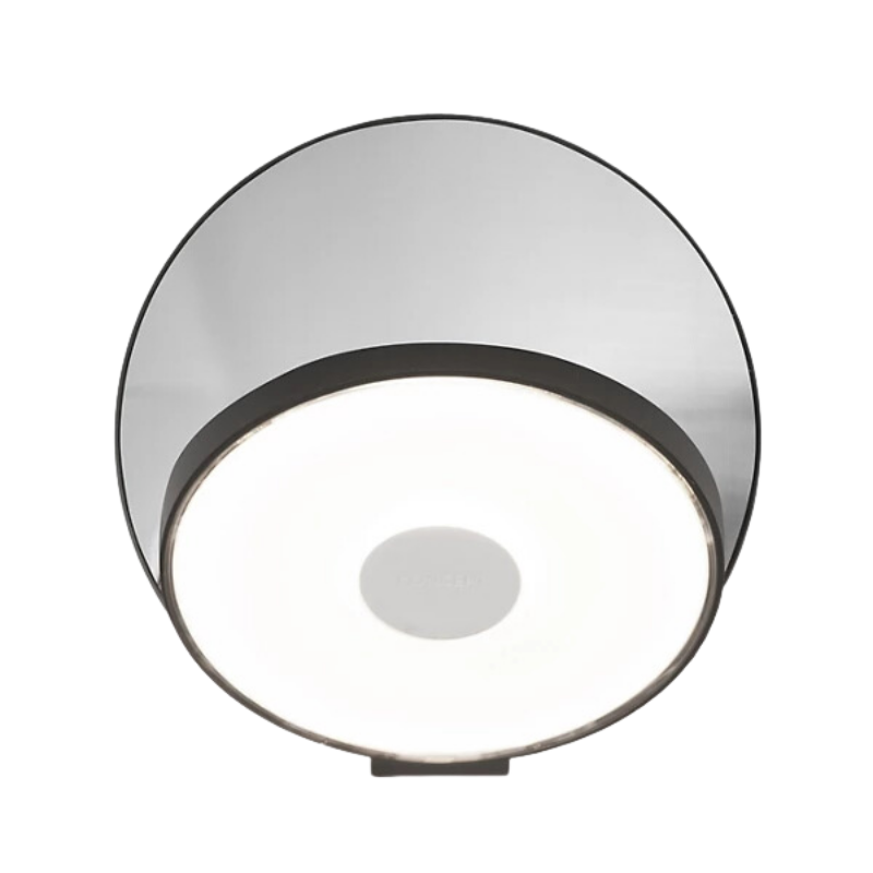 The Plug-In Gravy Wall Sconce from Koncept with the metallic black body and chrome plate.