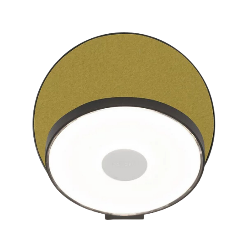 The Plug-In Gravy Wall Sconce from Koncept with the metallic black body and honeydew (felt) plate.