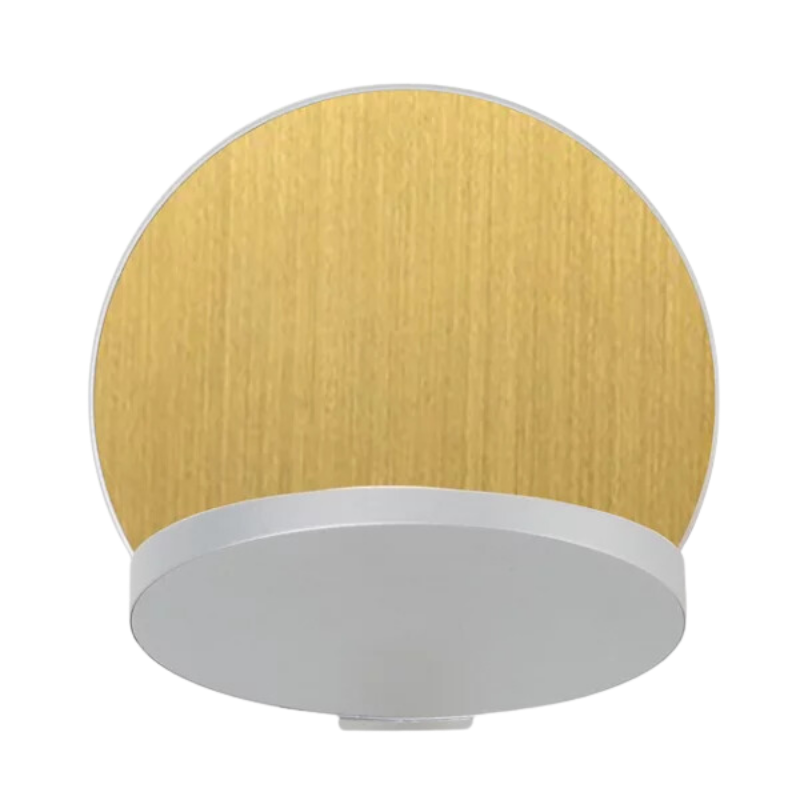 The Plug-In Gravy Wall Sconce from Koncept with the silver body and brass plate.