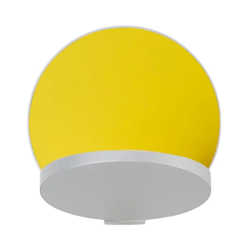 The Plug-In Gravy Wall Sconce from Koncept with the silver body and matte yellow plate.