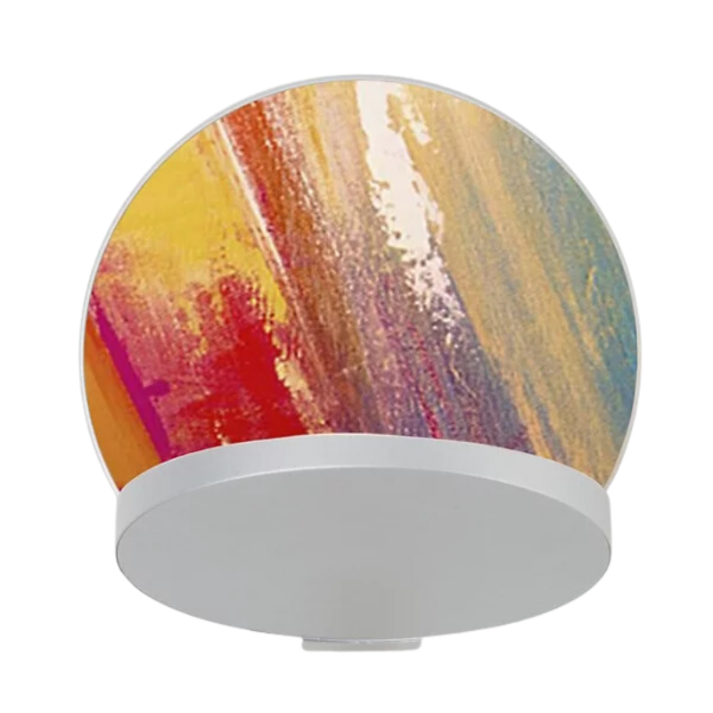 The Plug-In Gravy Wall Sconce from Koncept with the silver body and paintable plate.