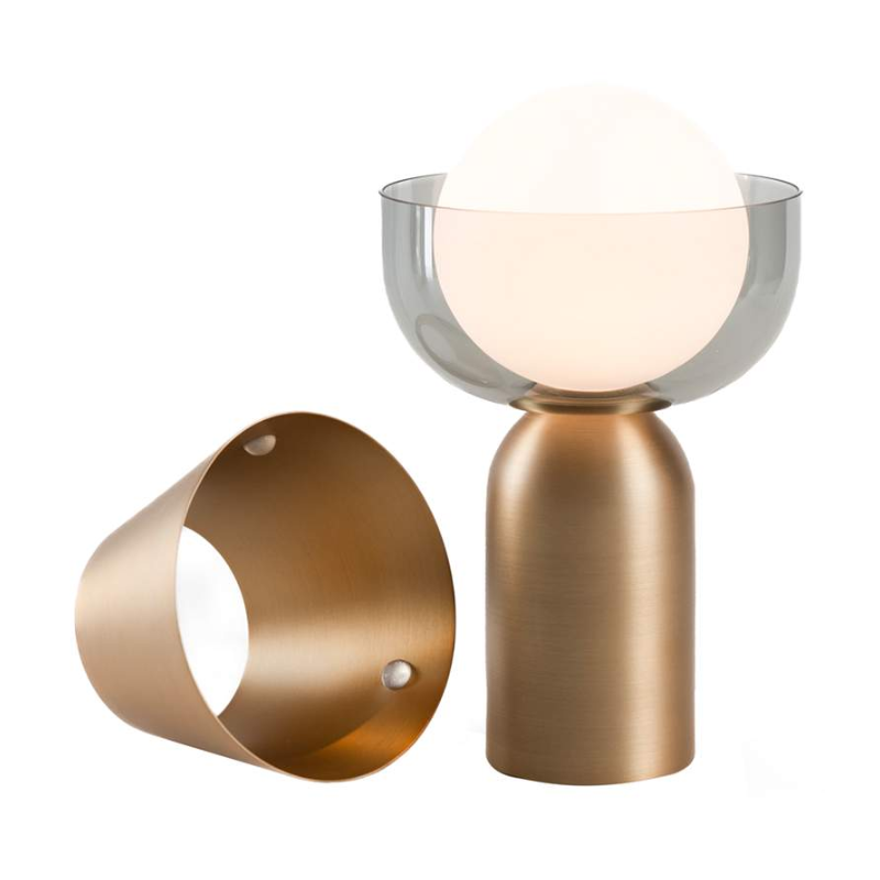 The Guy Portable Lamp from Koncept in brass with the bowl collar.