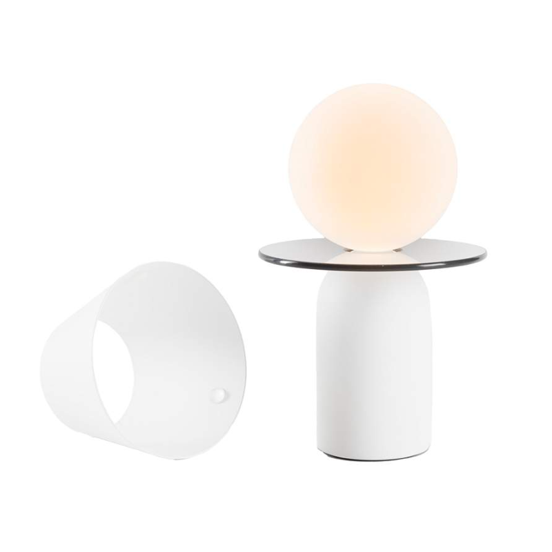 The Guy Portable Lamp from Koncept in matte white with the disk collar.