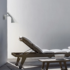 The AJ 50 Wall from Louis Poulsen in an outdoor lounge.