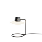 The low AJ Oxford Table Lamp from Louis Poulsen in opal.