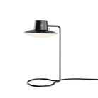 The tall AJ Oxford Table Lamp from Louis Poulsen in black metal and opal.