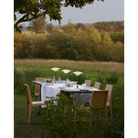 The PH 2/1 Portable from Louis Poulsen in an outdoor dining space.