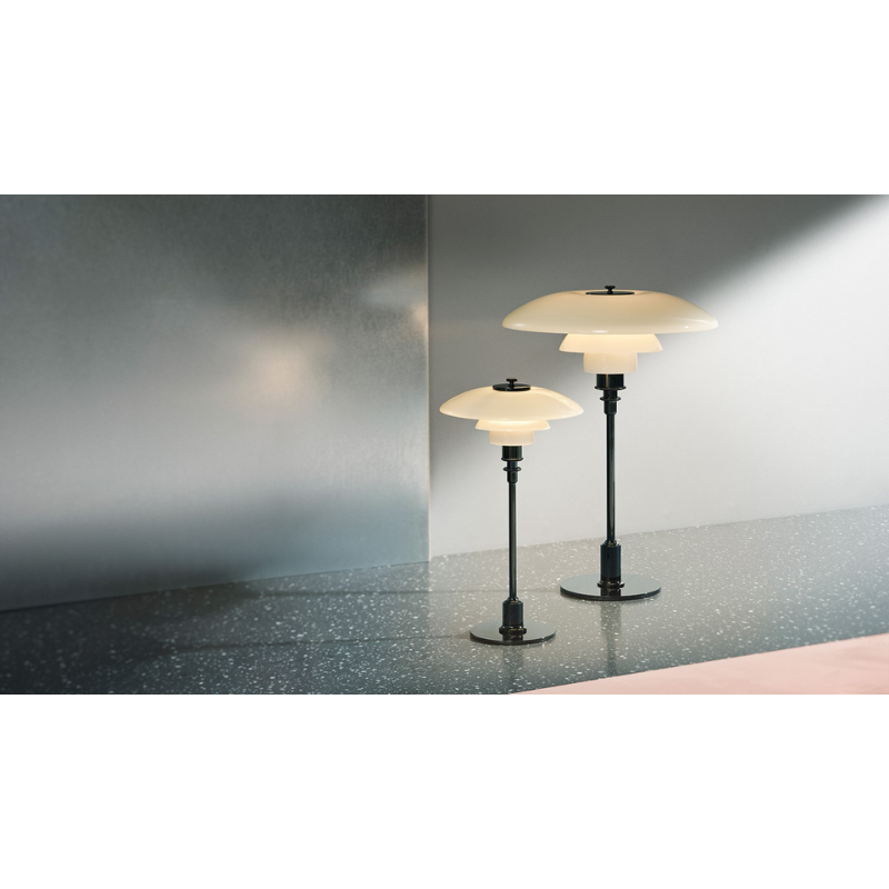 The PH 3½-2½ Glass Table Lamp from Louis Poulsen in a lighting collection image.