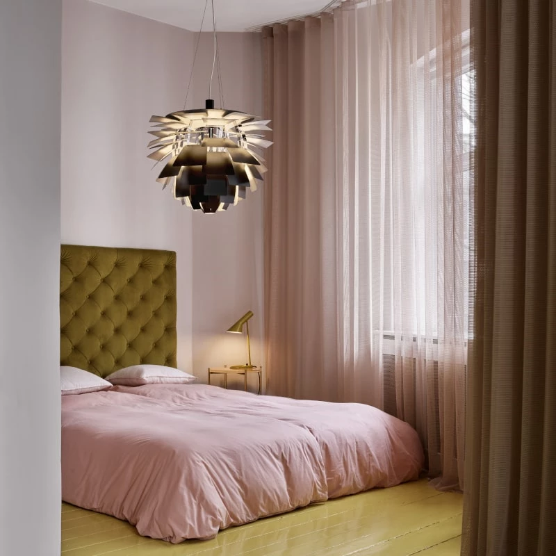 The PH Artichoke from Louis Poulsen in a bedroom.