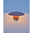 The PH Wall from Louis Poulsen used as an outdoor wall sconce.